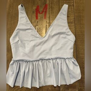 Medium Kortni Jeane top. Light blue.